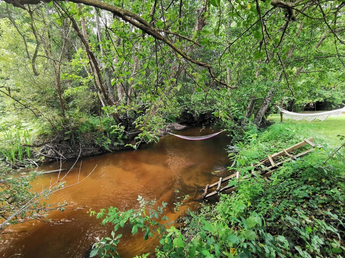 Hôtel Le tipi Arc-en-Ciel au bord de la rivière à Mios Extérieur photo